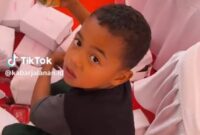 Caption : video viral seorang anak kecil mengais sisa makanan selepas upacara Bendera.