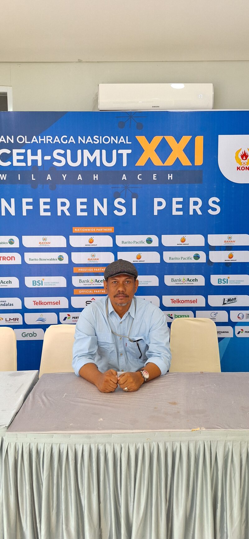 Caption : Chaidir Toweren, saat meliput PON Aceh SUMUT