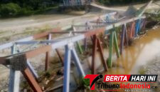 Foto : Kendati membahayakan dan mengancam pemukiman warga, terutama saat debit air bertambah. Namun, puing Jembatan rangka baja Mbarung masih dibiarkan berada di tengah aliran sungai Alas Aceh Tenggara. (Abdul ganigasek.).