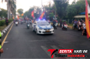 ‎Mobil patroli Polres Bitung lakukan pengawalan massa nobar. (Ft.ist)
