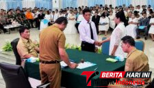 Walikota Hengky Honandar S.E, Bersama Gubernur Sulut, Yulius Selvanus pada kegiatan Harganas ke-33