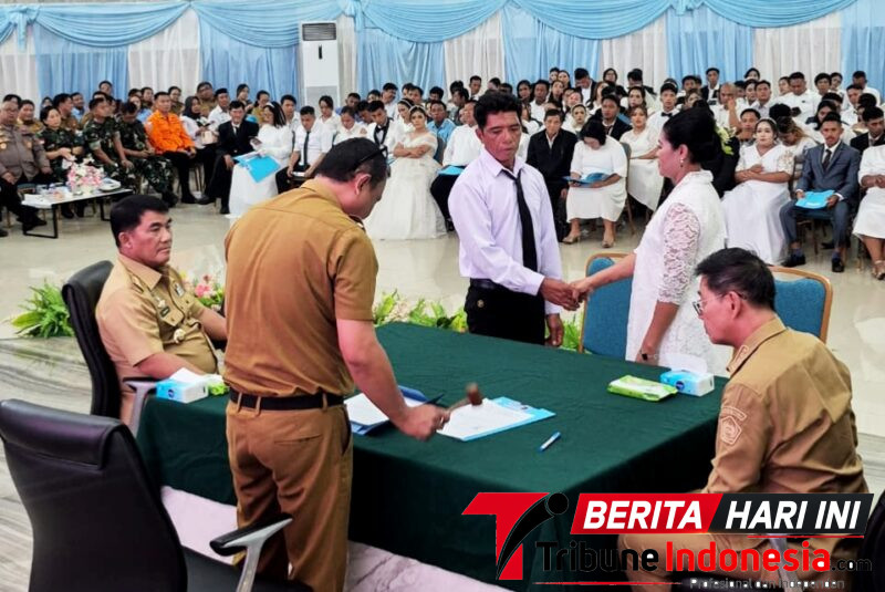Walikota Hengky Honandar S.E, Bersama Gubernur Sulut, Yulius Selvanus pada kegiatan Harganas ke-33