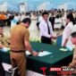 Walikota Hengky Honandar S.E, Bersama Gubernur Sulut, Yulius Selvanus pada kegiatan Harganas ke-33