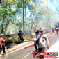 ‎Polsek Matuari Polres Bitung Bersama Damkar Pemkot Bitung saat Memadamkan api Di lokasi Karhutla, Batu Putih. (Dok. Istimewa)
