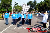Walikota Bitung, Hengky Honandar, S.E, Saat melepas Barisan pertama FKUB di garis Start. (Ft. talia)