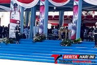 Momen Saat Laporan Komandan Upacara, AKP Dwi Dea Anggraini, S.Tr.K., S.I.K., M.H., Kepada Inspektur Upacara, Walikota Bitung, Hengky Honandar S.E., (Ft. talia)
