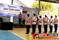 Kapolres Bitung, AKBP Arie Sulistyo Nugroho, S.I.K., M.H., Saat Memimpin Upacara Sertijab. (Ft. talia)
