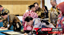 Wali Kota Bitung Hengky Honandar, S.E. saat melakukan penandatanganan.(Dok. Istimewa)
‎