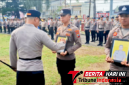 Kapolres Bitung AKBP Arie Sulistyo Nugroho, S.I.K., M.H., Saat memimpin upacara Pemberhentian Tidak Dengan Hormat (PTDH) secara In absentia terhadap dua personel Polres Bitung. (ft. Humas Polres Bitung)