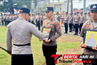 Kapolres Bitung AKBP Arie Sulistyo Nugroho, S.I.K., M.H., Saat memimpin upacara Pemberhentian Tidak Dengan Hormat (PTDH) secara In absentia terhadap dua personel Polres Bitung. (ft. Humas Polres Bitung)